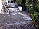 Old flagstone path will be removed and replaced with stepping stones that will complement the new landscape design.